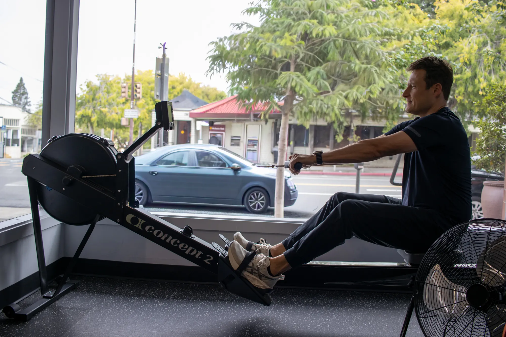 Dario rowing on a Concept2 erg during a conditioning session
