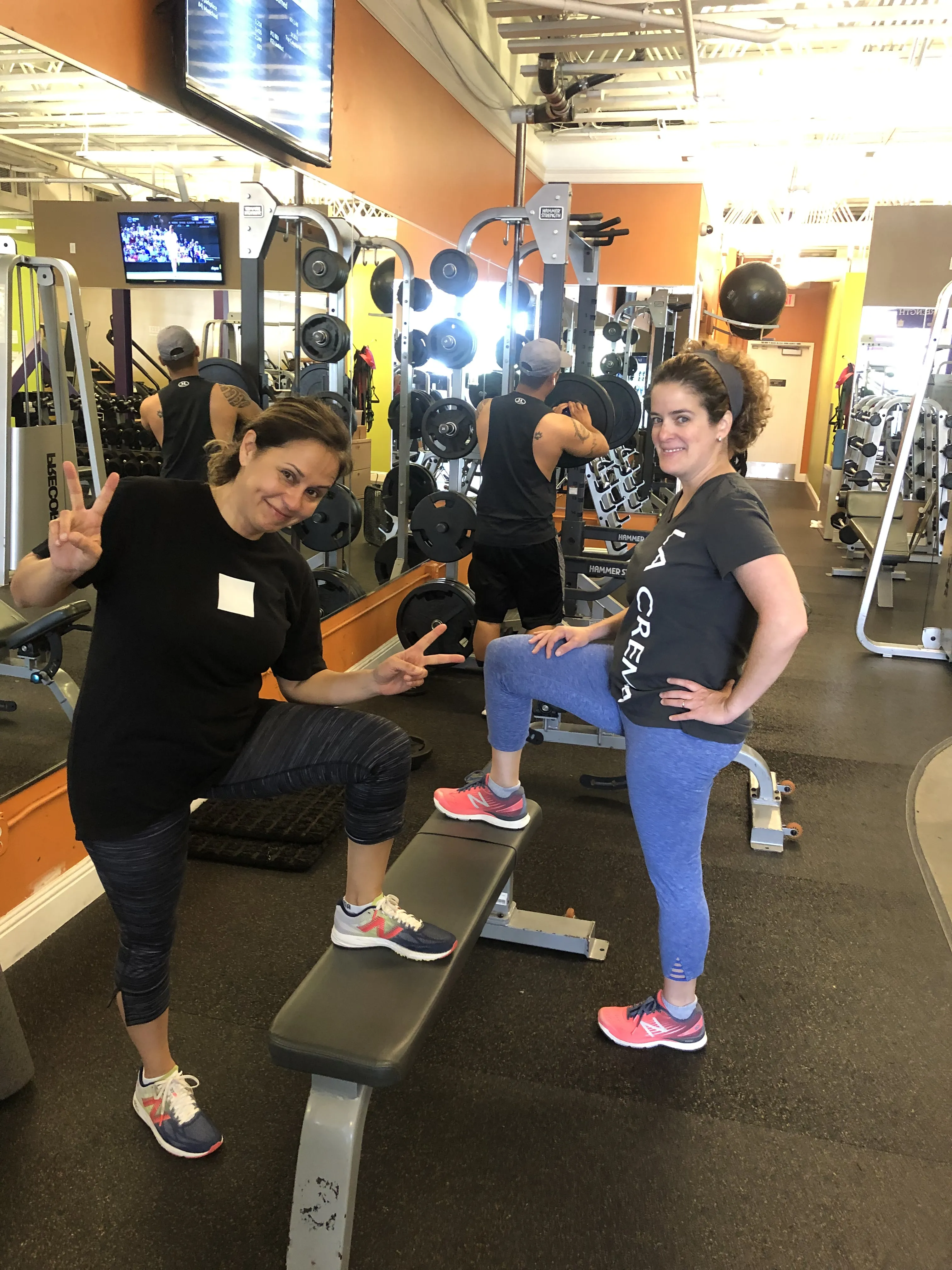 Two longtime clients between sets at the gym