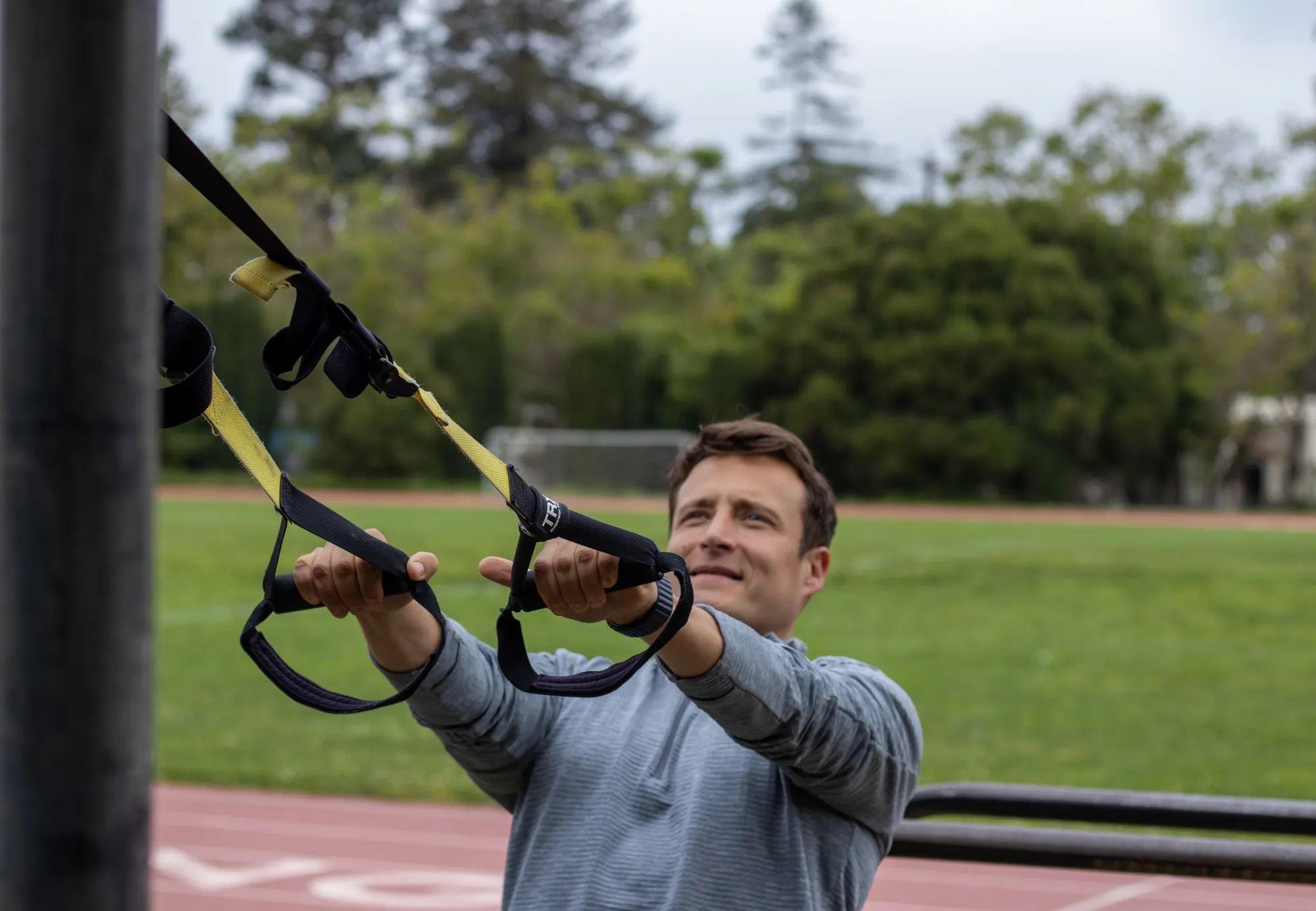 Suspension training session outdoors